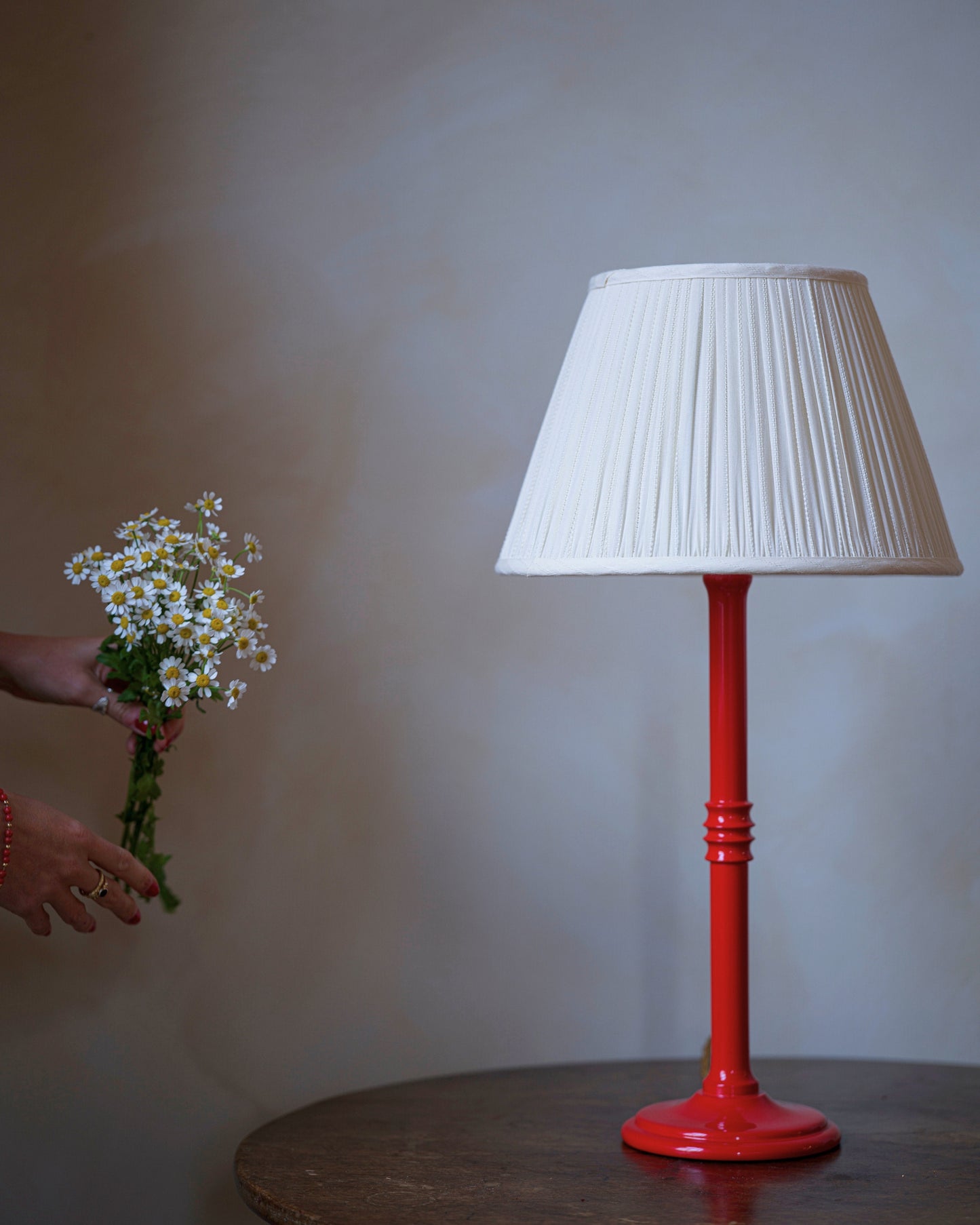 Embroidered lampshade in daisy on lampstand