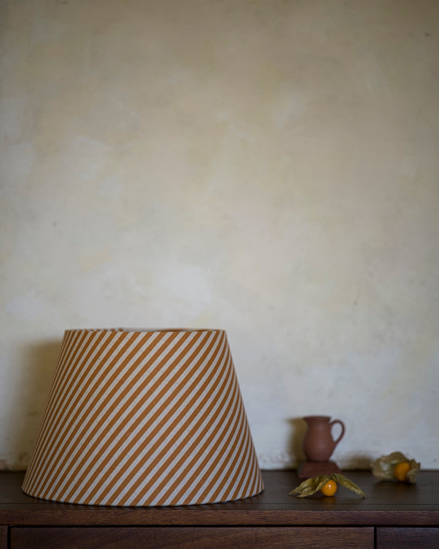 Luxury empire lampshade in goldberry on drawers