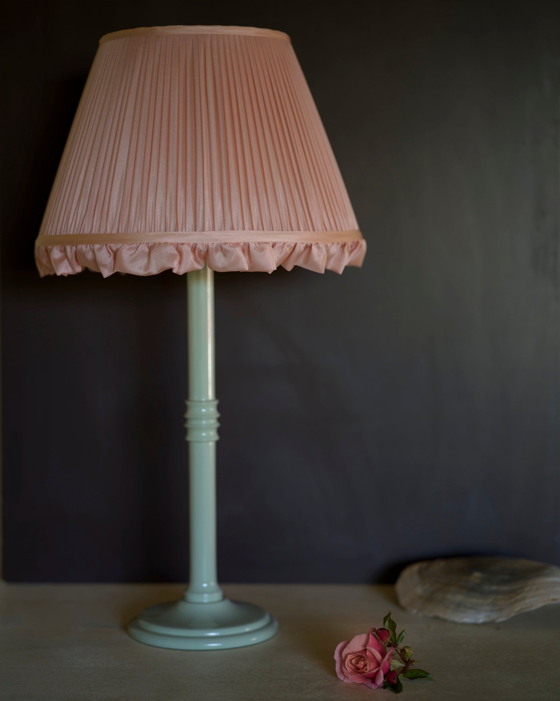 Luxury frilly lampshade in peony on lampstand