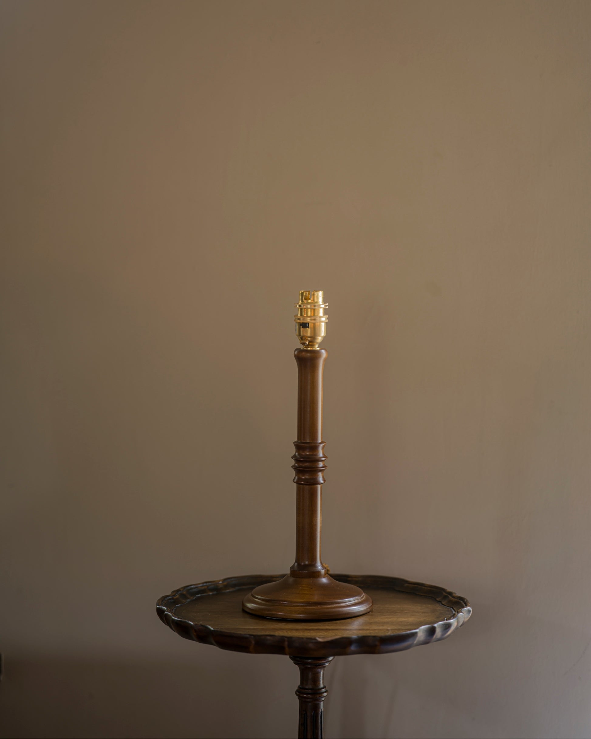 Small unlacquered lampstand in wood