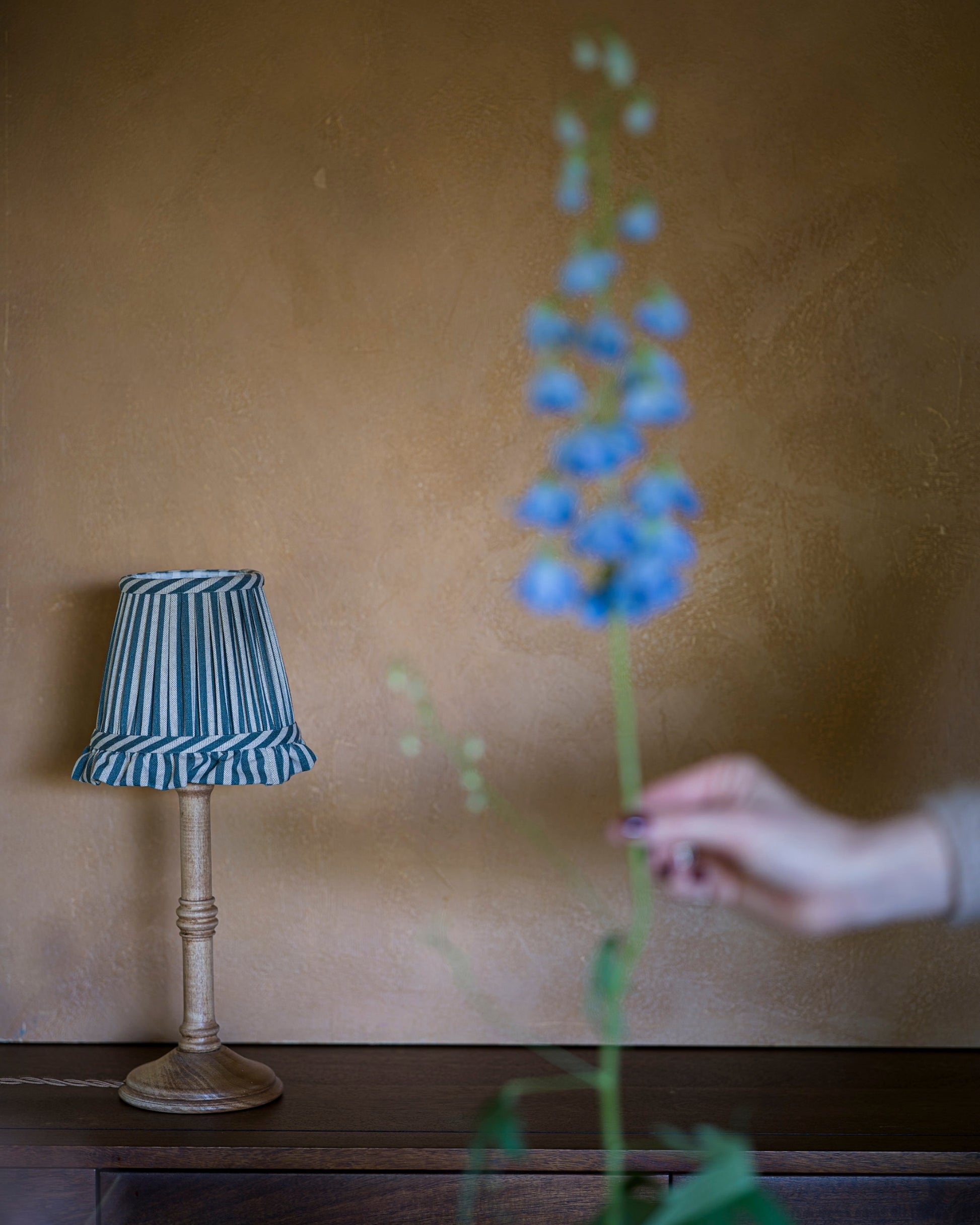 Luxury frilled wall light lampshade in delphinium on lampstand