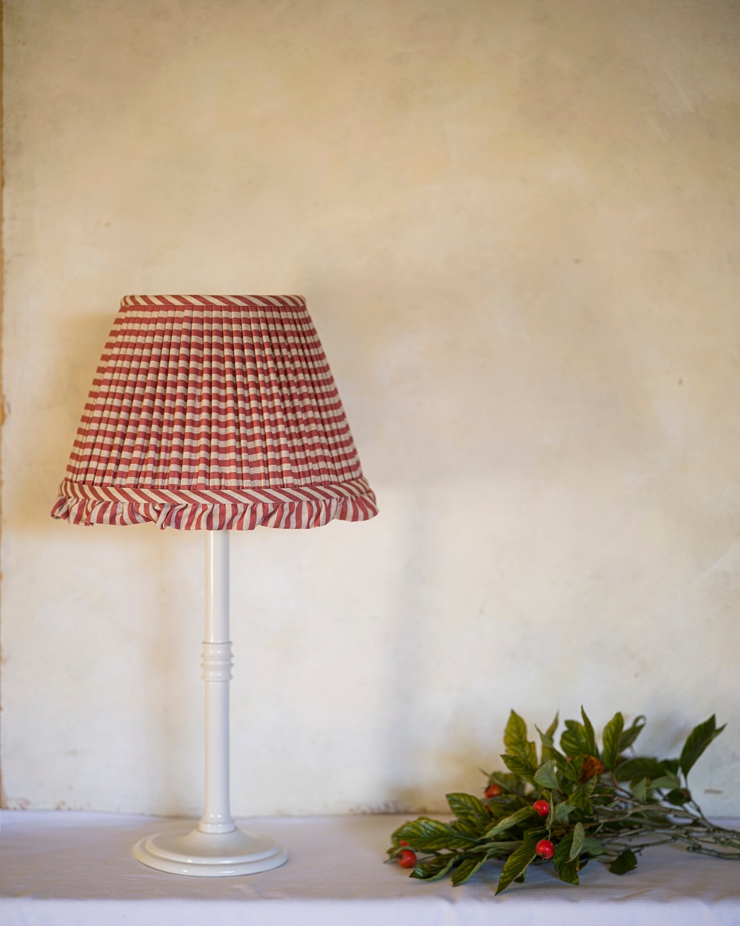 Luxury red lampshade on lampstand