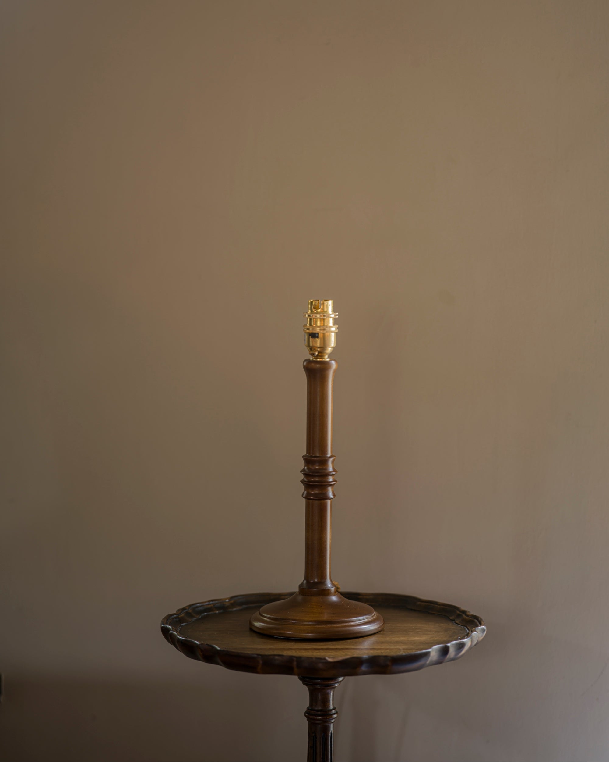 Small unlacquered lampstand in wood