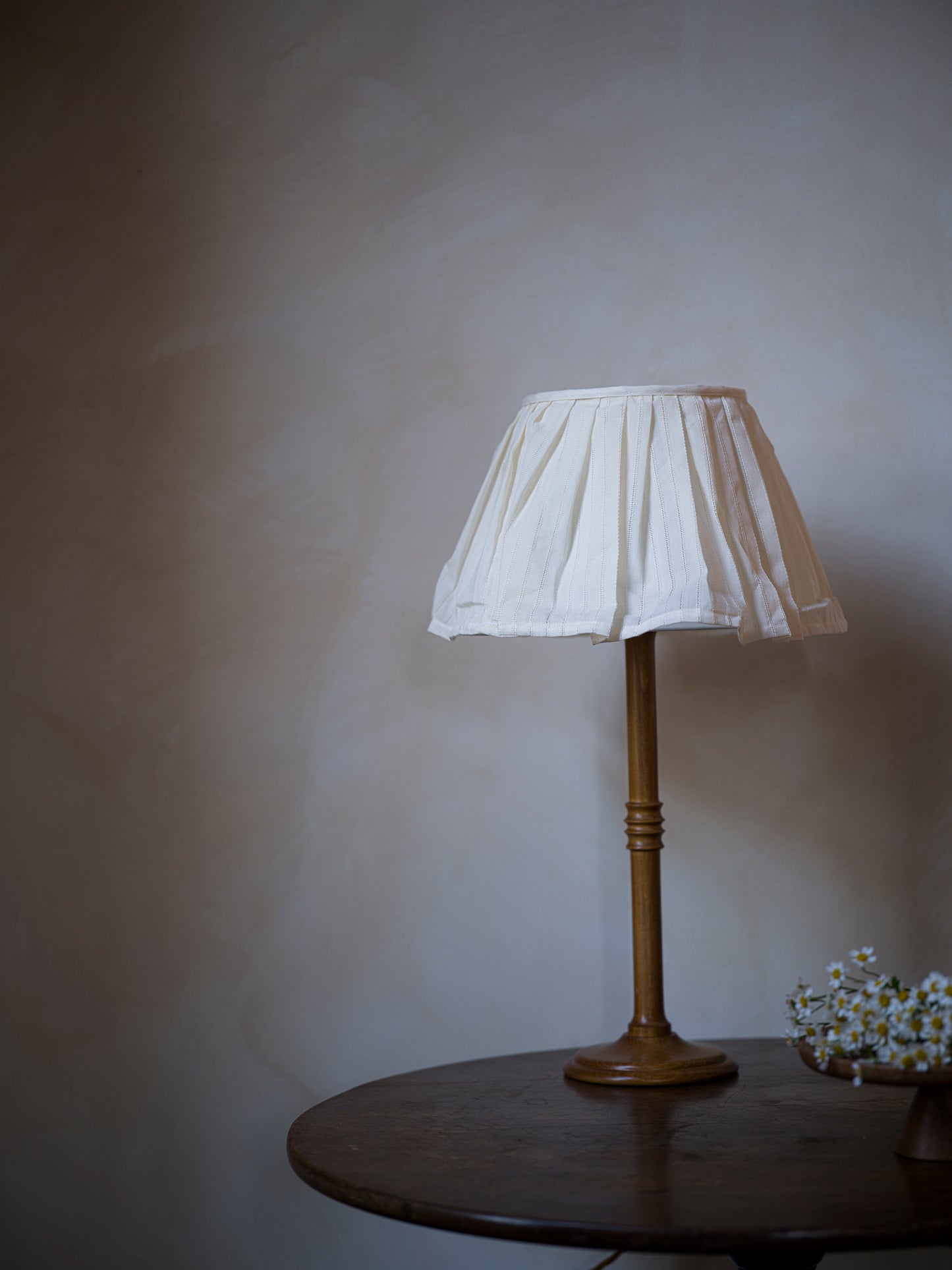 Unlacquered lampstand in wood with lampshade